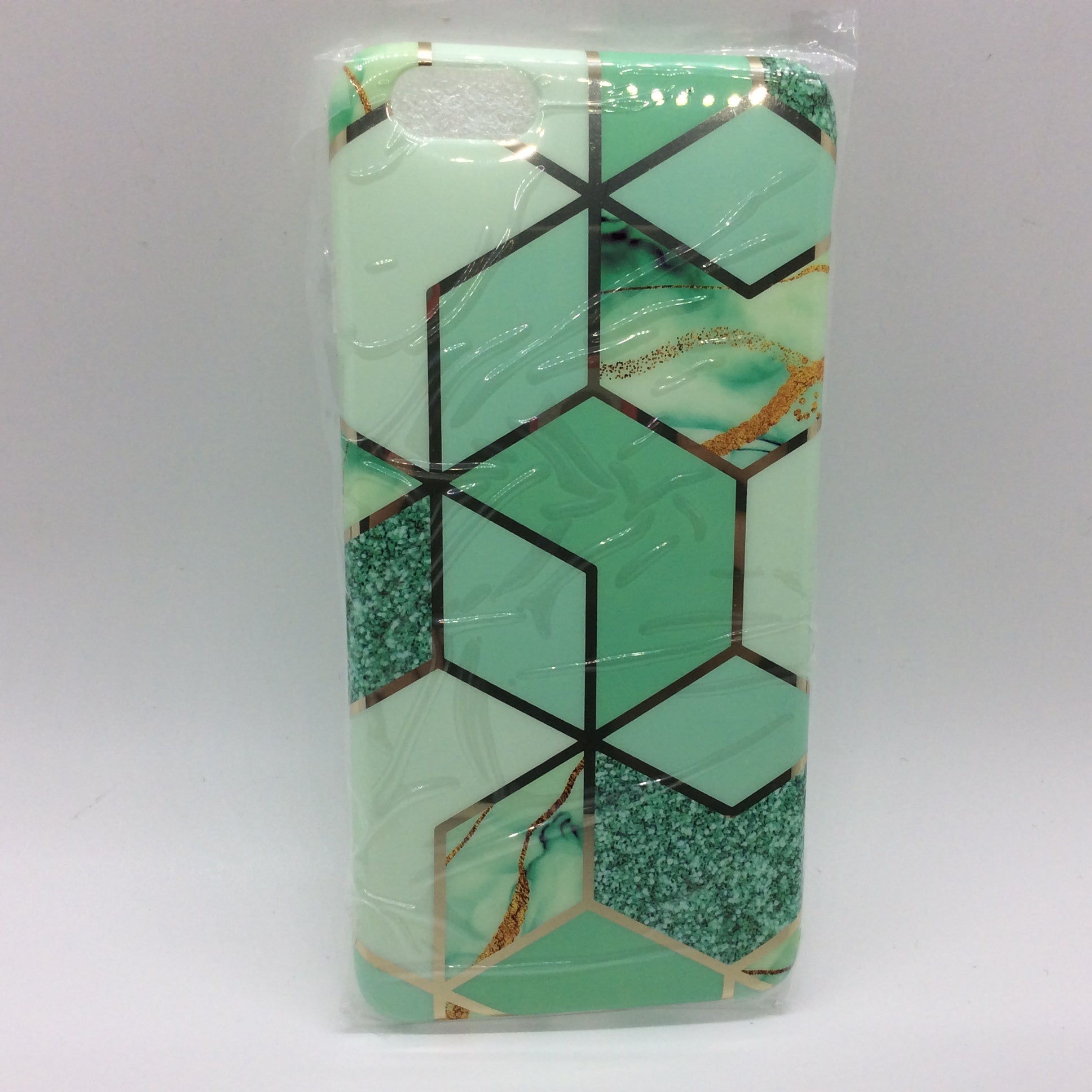 a glass vase with a green and black design on it