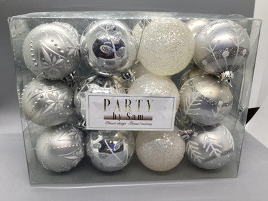 a clear box filled with silver and white ornaments