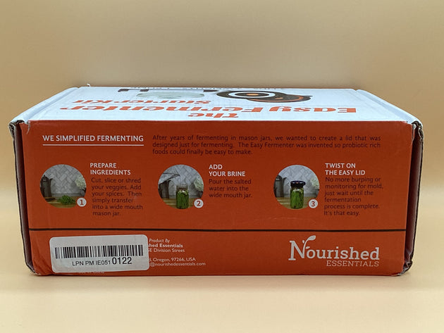 a box of nourished tea sitting on a table